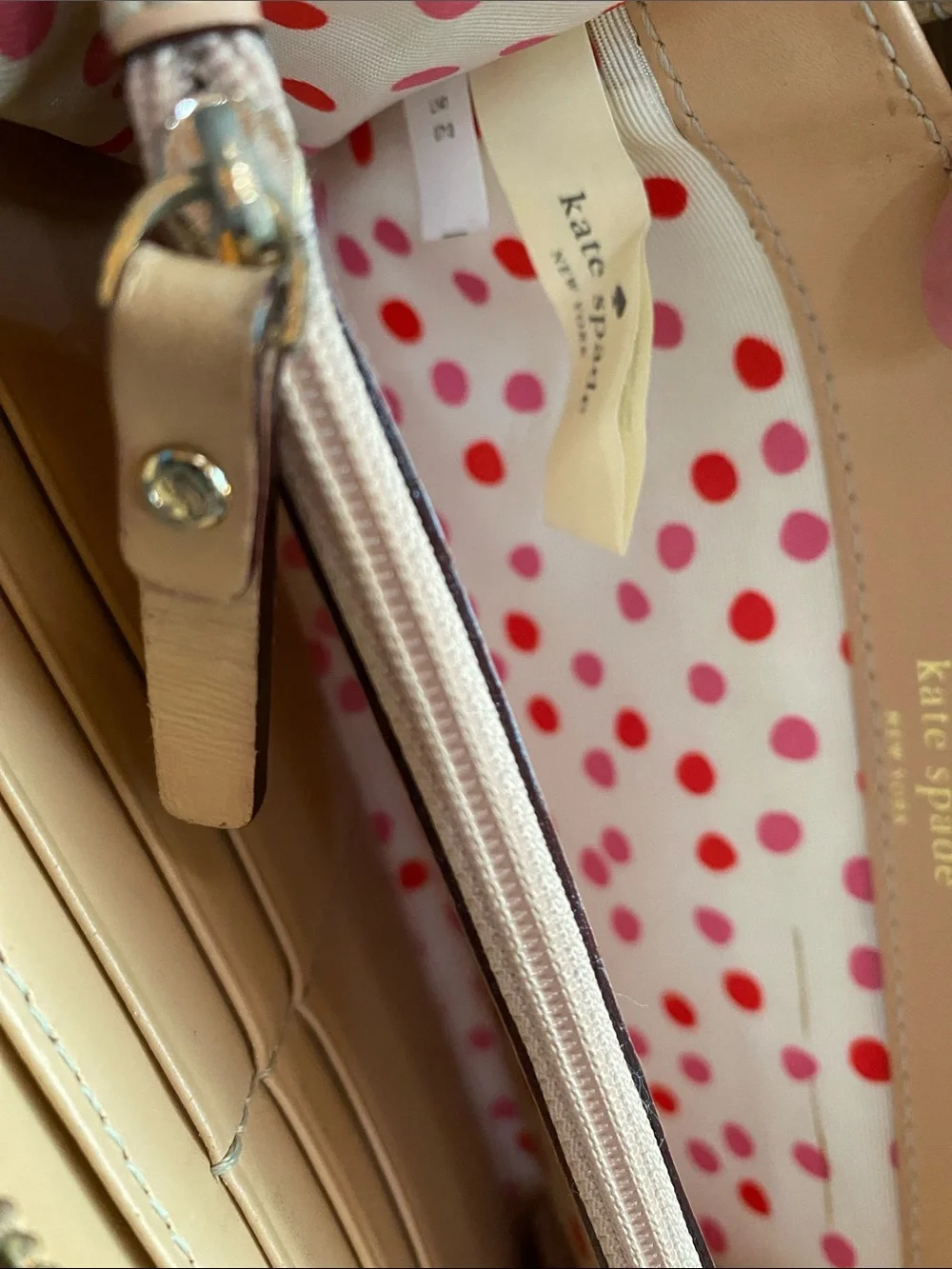 kate spade cream pebbled leather zip-around clutch wallet